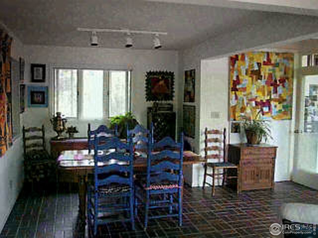 117 Apple Ridge Road Lyons, CO 80540 - Photo 10 of 11 a view of a dining room with furniture and wooden floor