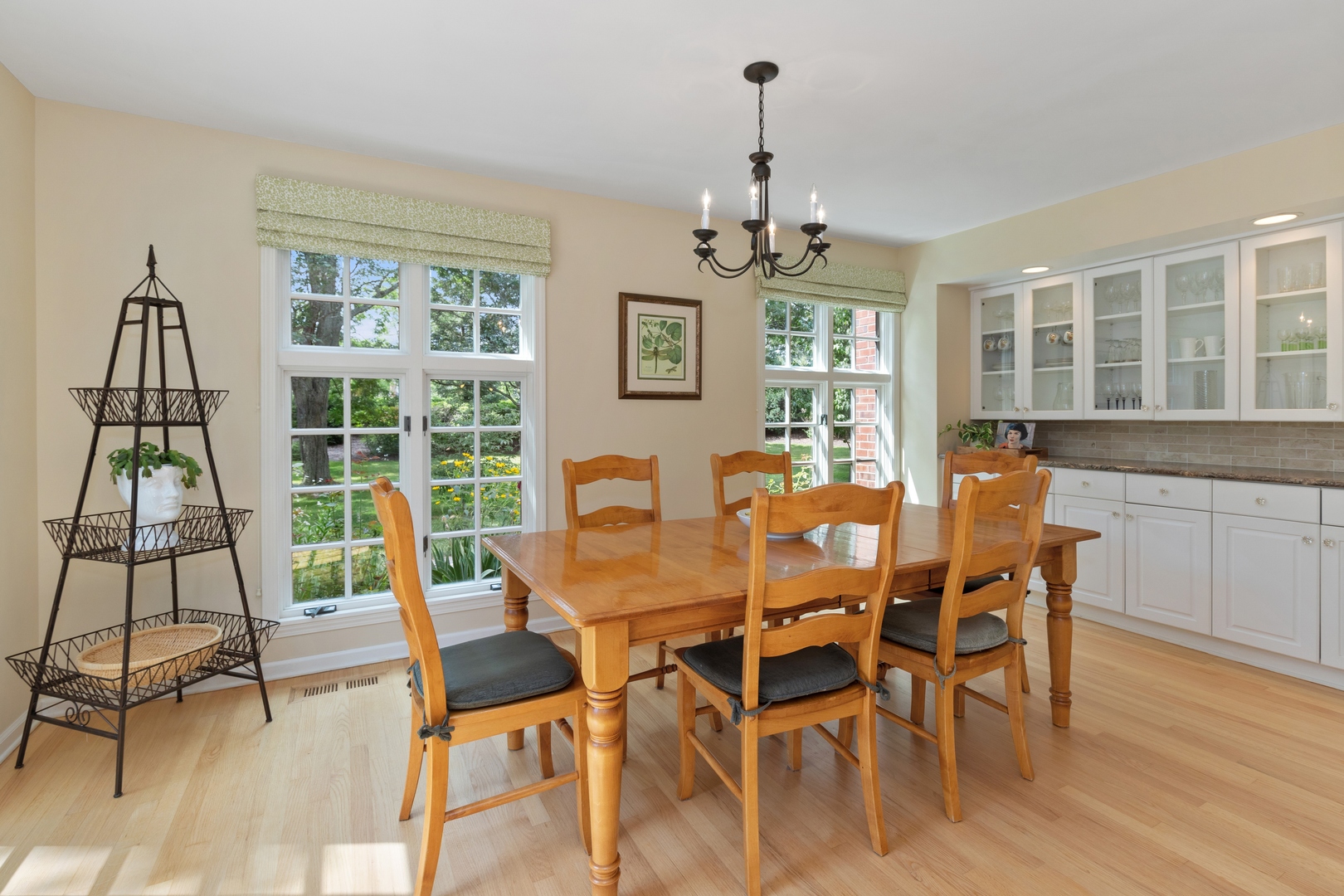390 South Basswood Road Lake Forest, IL 60045 - Photo 11 of 38 a view of a dining room with furniture window and wooden floor