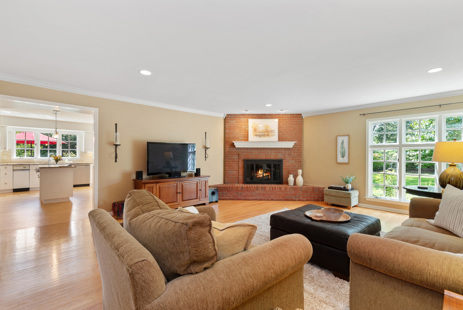 390 South Basswood Road Lake Forest, IL 60045 - Photo 13 of 38 a living room with furniture fireplace and a flat screen tv