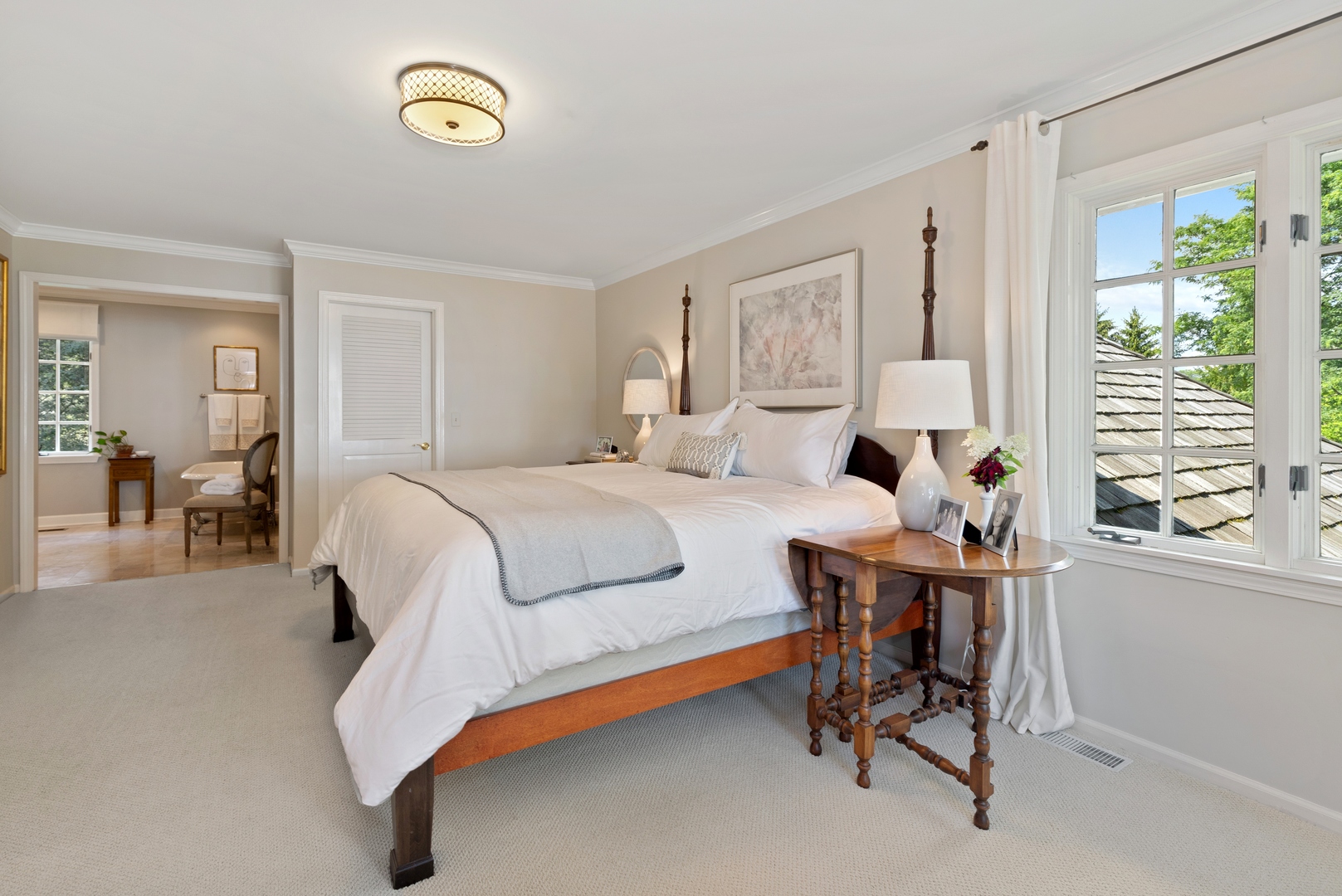 390 South Basswood Road Lake Forest, IL 60045 - Photo 17 of 38 a bedroom with a bed and a table