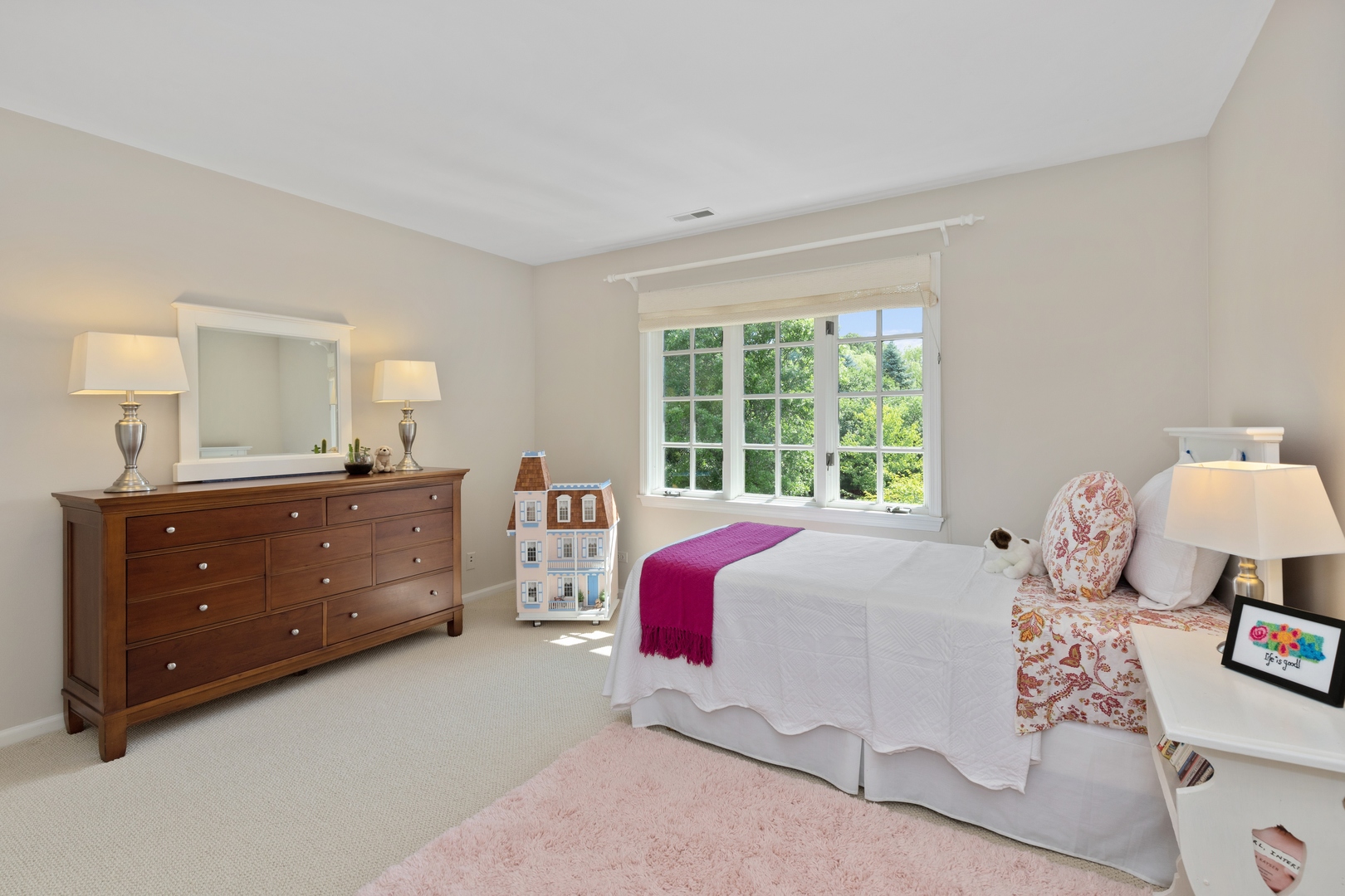 390 South Basswood Road Lake Forest, IL 60045 - Photo 20 of 38 a bed room with a bed window and a dresser