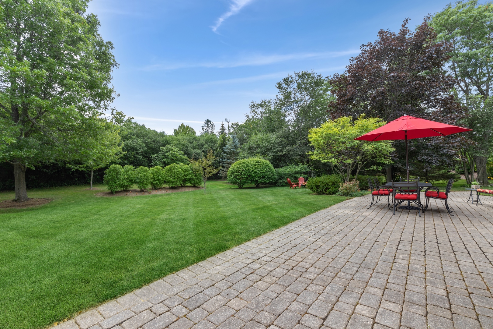 390 South Basswood Road Lake Forest, IL 60045 - Photo 26 of 38 a view of a backyard with a patio