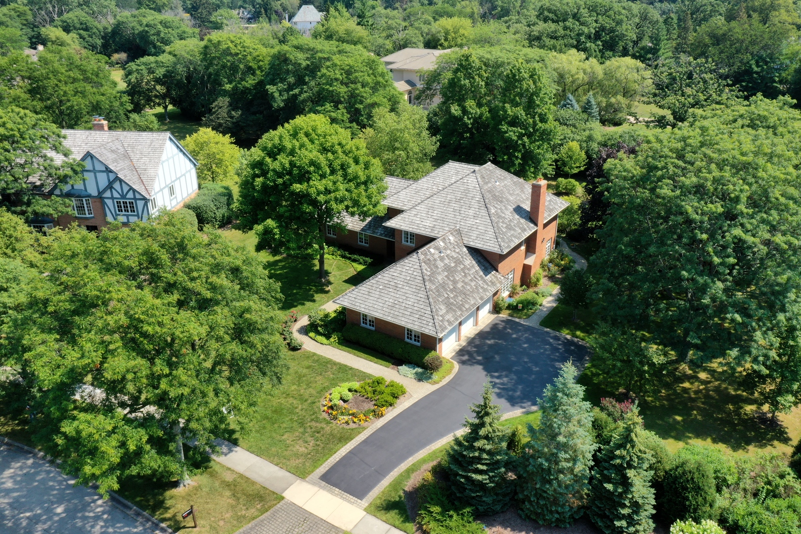390 South Basswood Road Lake Forest, IL 60045 - Photo 29 of 38 an aerial view of a house with a yard