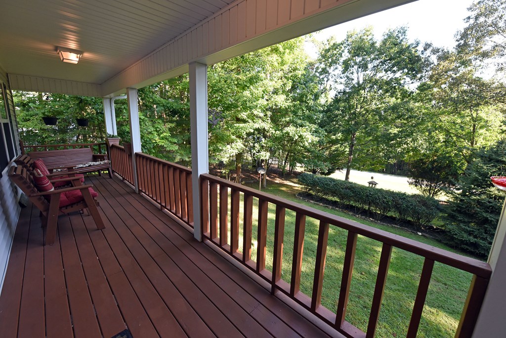 31 Lance Crossing Road Blairsville, GA 30512 - Photo 30 of 52 a view of balcony with wooden floor and outdoor seating
