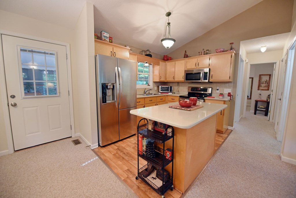 31 Lance Crossing Road Blairsville, GA 30512 - Photo 9 of 52 a kitchen that has a lot of cabinets a sink and appliances
