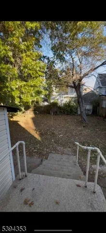 a view of outdoor space with wooden floor
