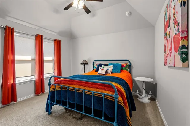 a view of a living room with furniture and wooden floor
