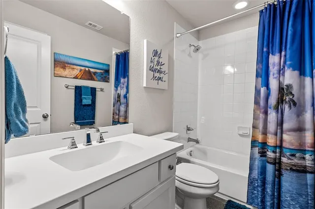 a bed room with a bed and a window