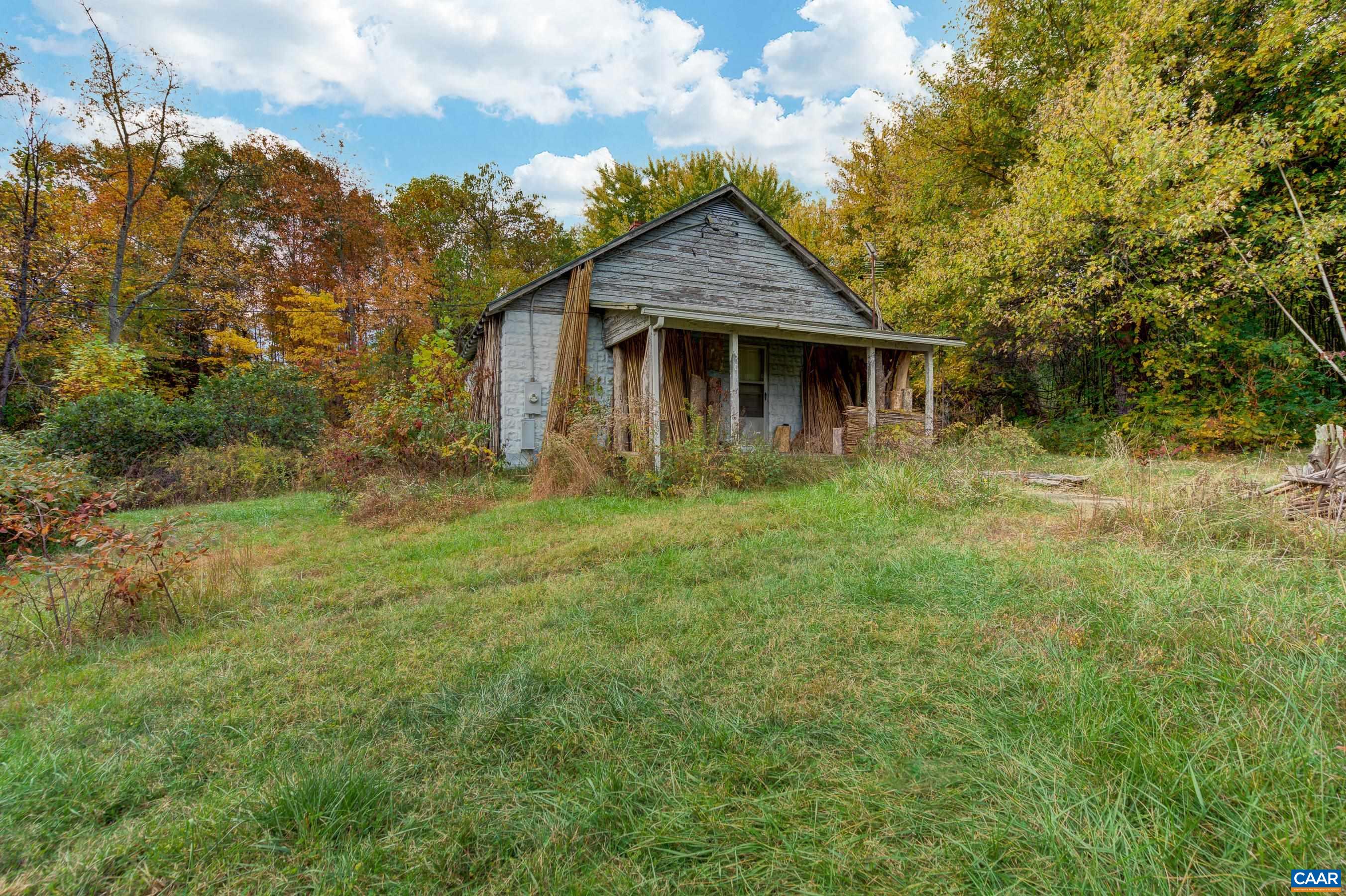 2552 White Hall Road Crozet, VA 22932 - Photo 12 of 27 a front view of a house with garden