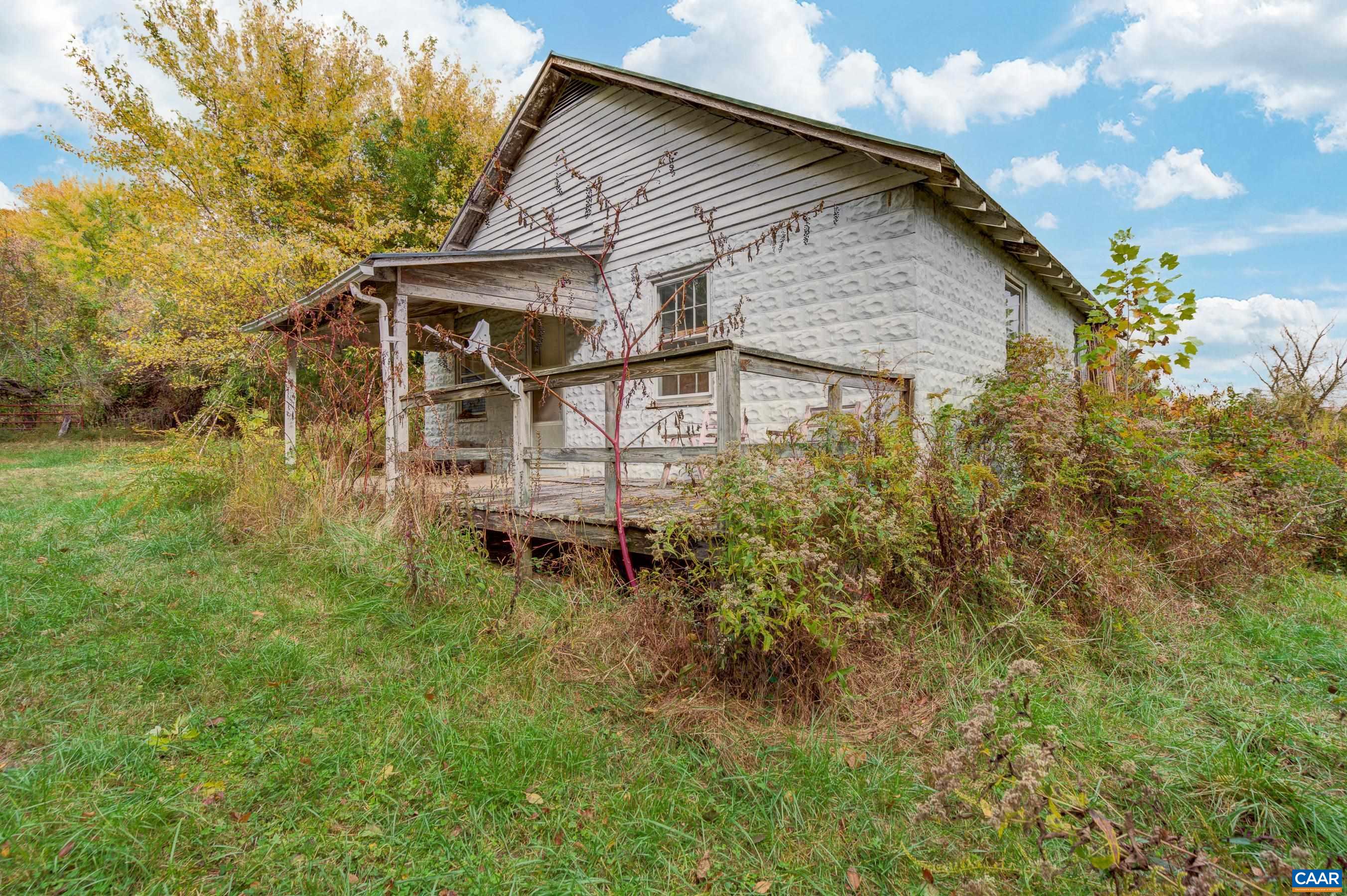2552 White Hall Road Crozet, VA 22932 - Photo 14 of 27 a view of a house with a yard