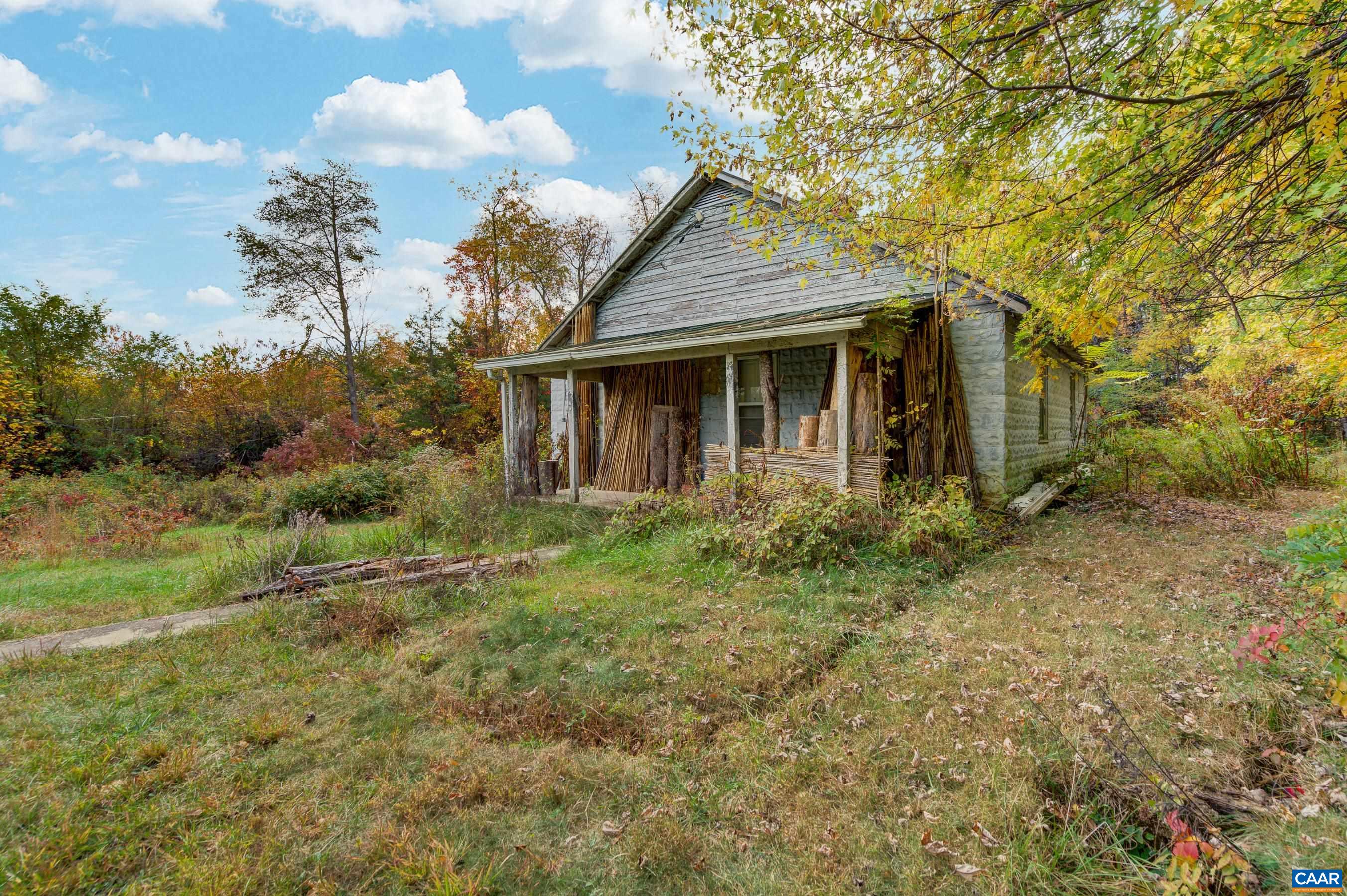 2552 White Hall Road Crozet, VA 22932 - Photo 22 of 27 a view of a house with a yard
