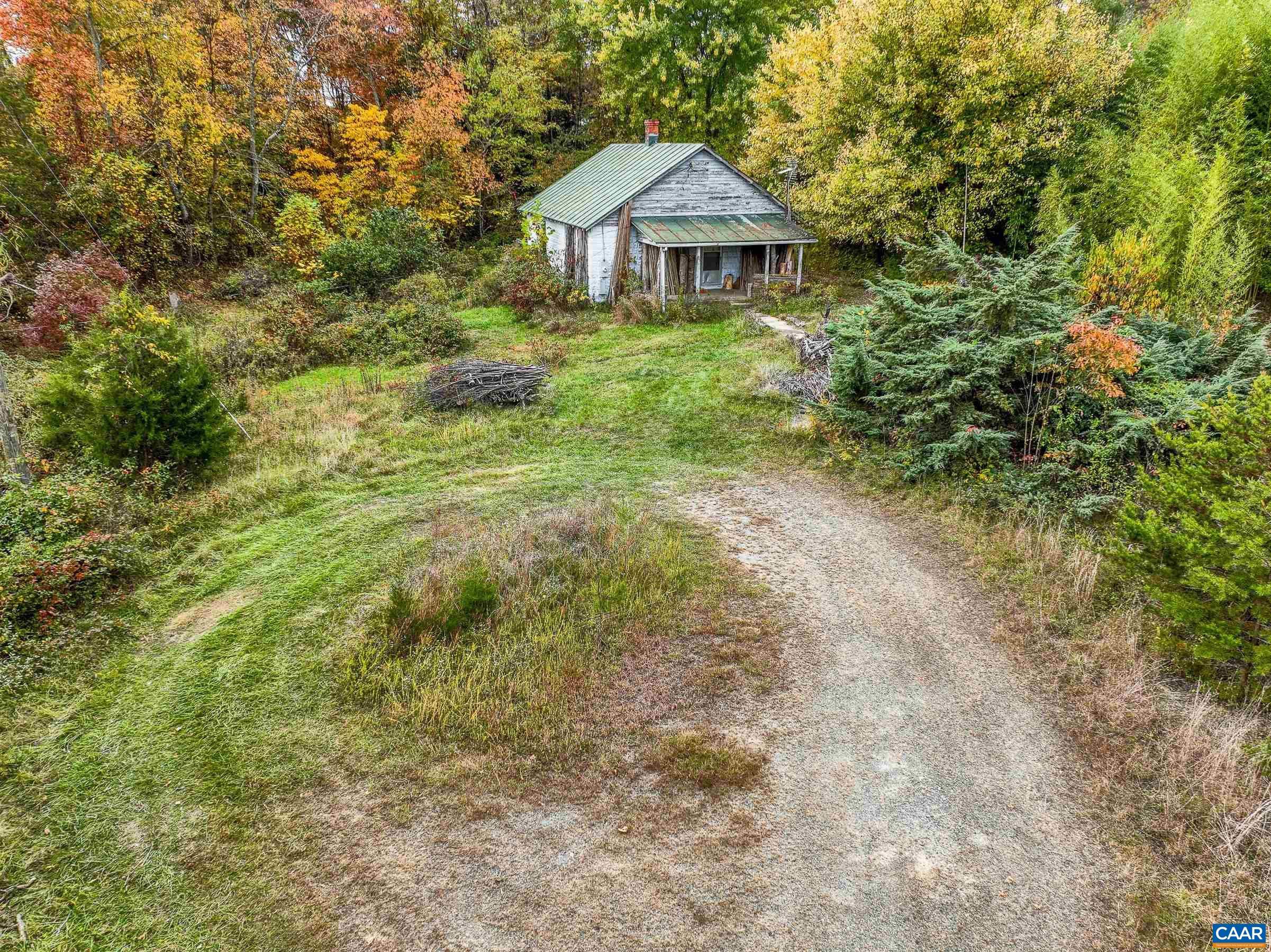 2552 White Hall Road Crozet, VA 22932 - Photo 8 of 27 a view of a house with a yard