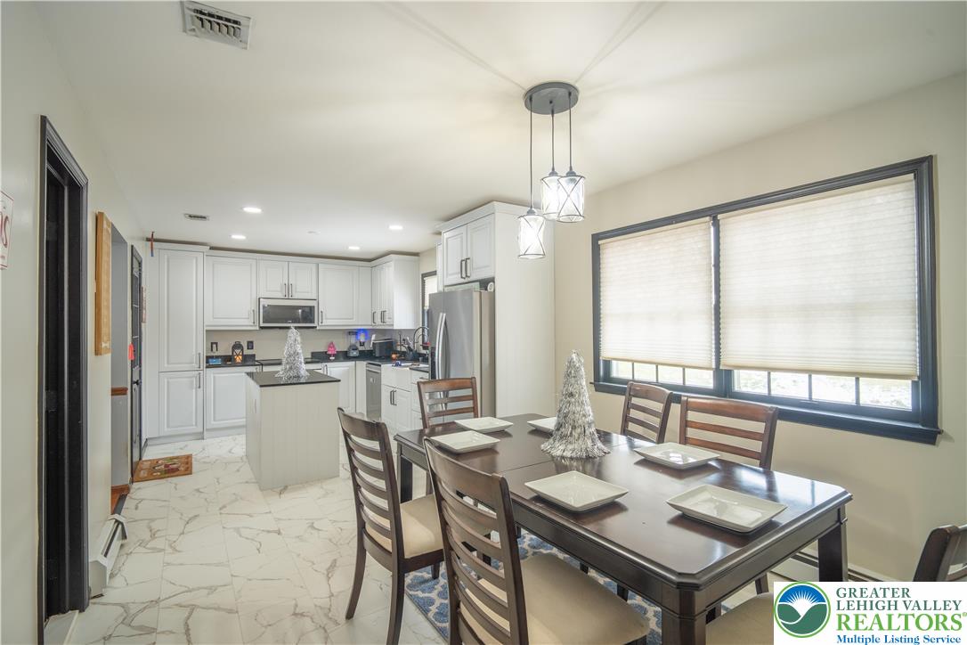 3955 Coplay Creek Road Schnecksville, PA 18078 - Photo 13 of 34 a kitchen with a table and chairs