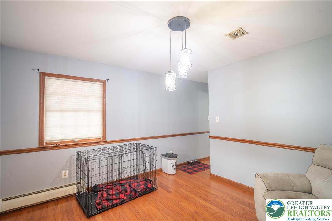 3955 Coplay Creek Road Schnecksville, PA 18078 - Photo 16 of 34 a bedroom with a bed and a window