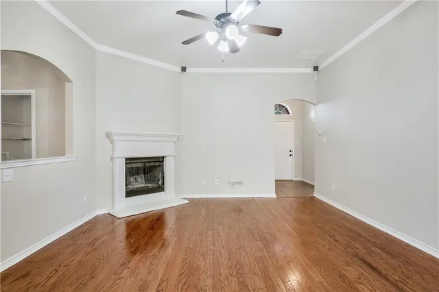 a view of a chandelier in big room and chandelier