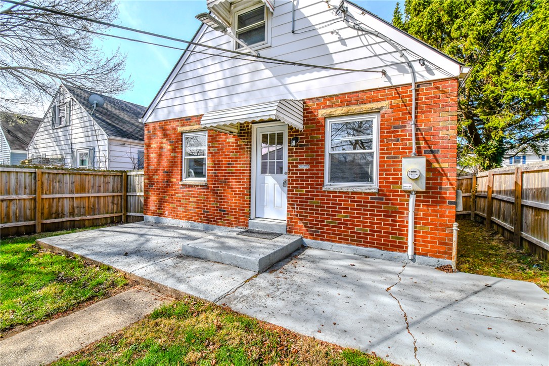 816 South Smithville Road Dayton, OH 45403 - Photo 29 of 33 This charming brick and siding residence features a welcoming patio and fenced yard.