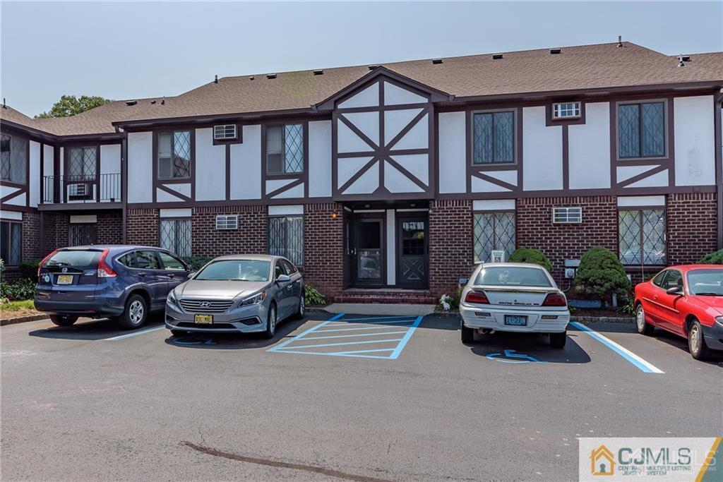 a car parked in front of a house