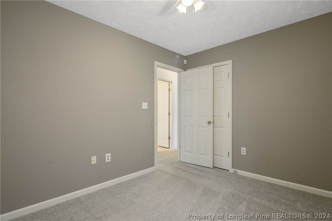 51 Overlook Road Cameron, NC 28326 - Photo 29 of 40 an empty room with a empty space and a window