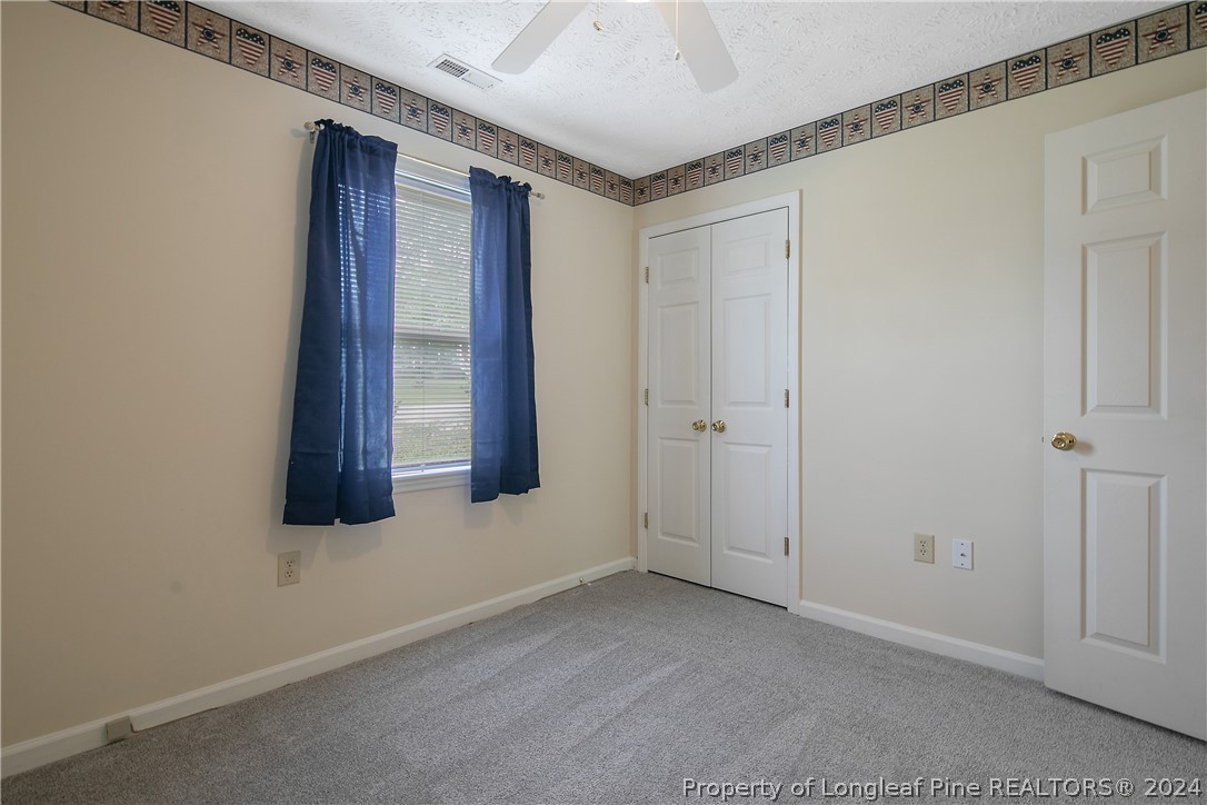51 Overlook Road Cameron, NC 28326 - Photo 34 of 40 a view of an empty room with window