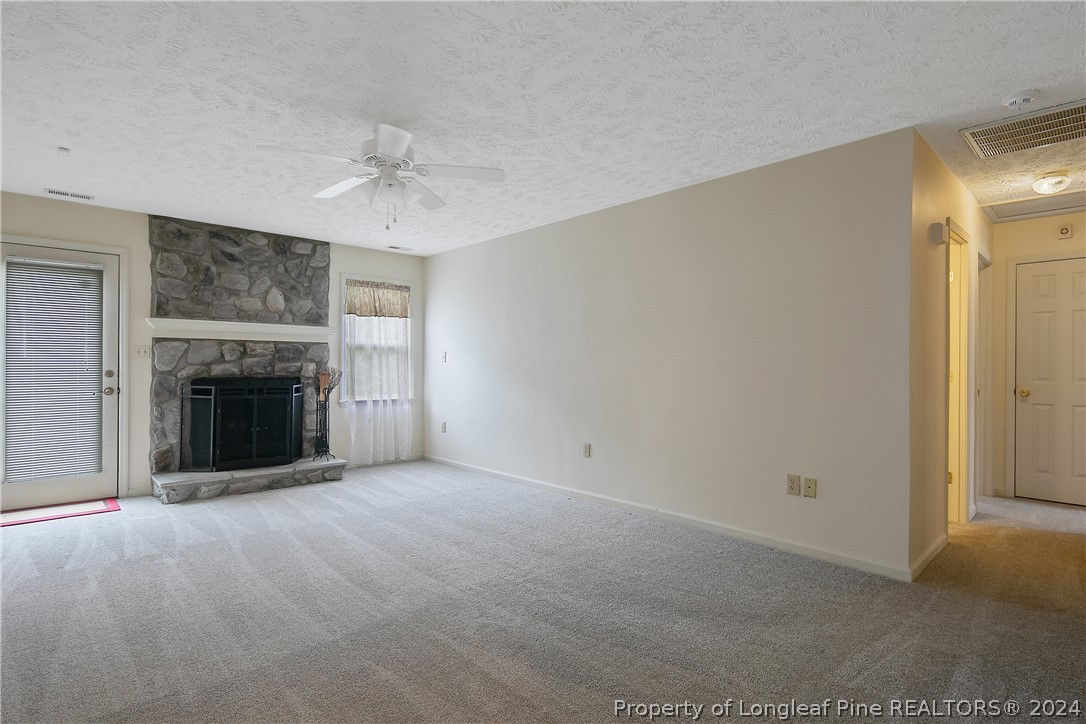 51 Overlook Road Cameron, NC 28326 - Photo 7 of 40 a view of empty room with a fireplace