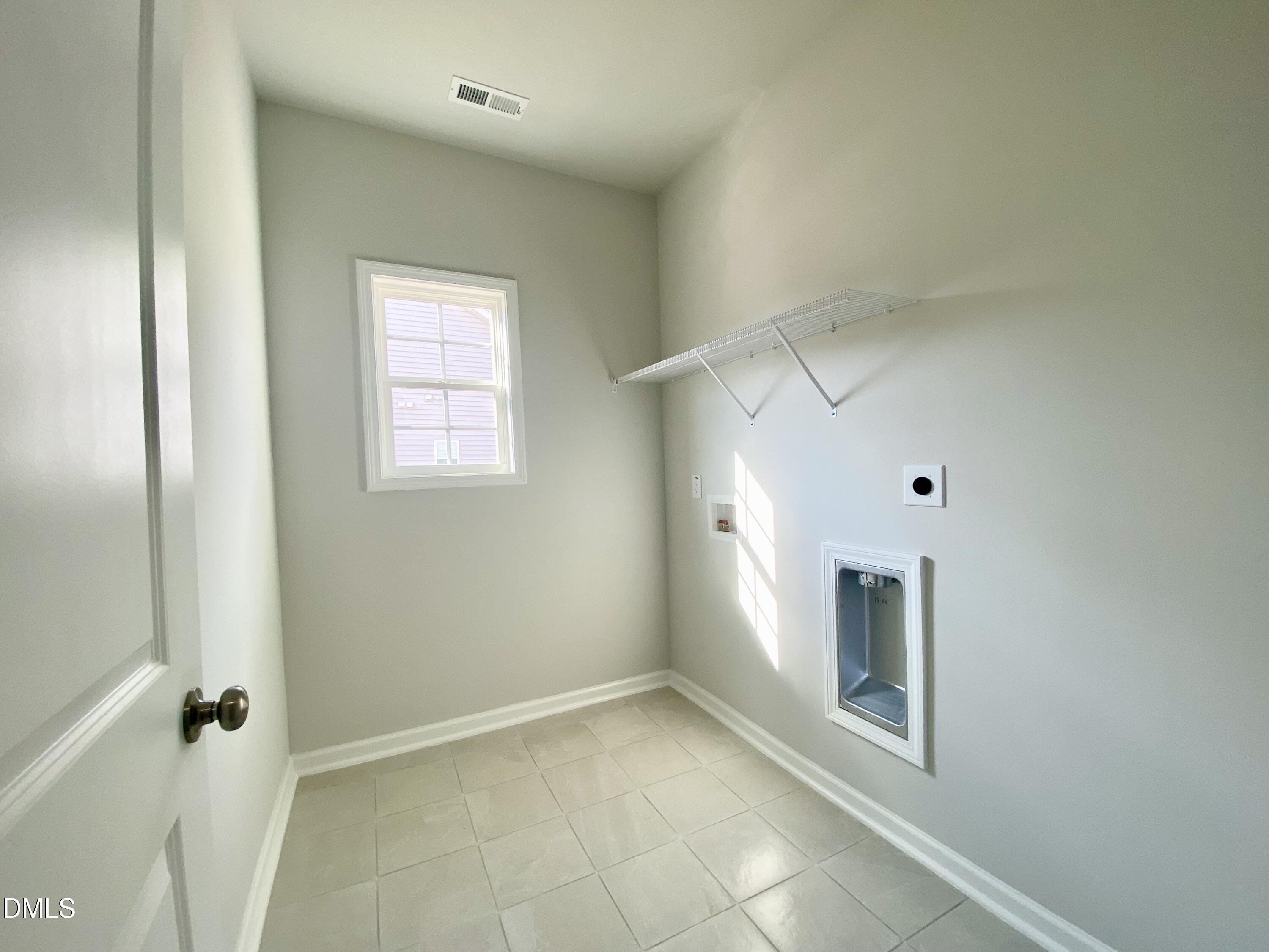 155 Nectar Lane Bunnlevel, NC 28323 - Photo 11 of 16 a view of an empty room with a window