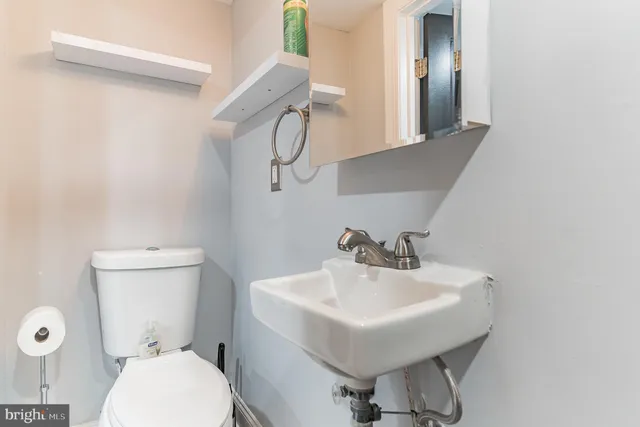 a bathroom with a sink and a shower