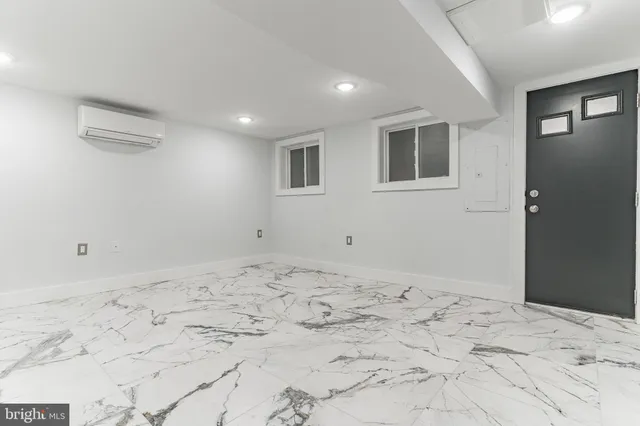 a bathroom with a sink a mirror and shower