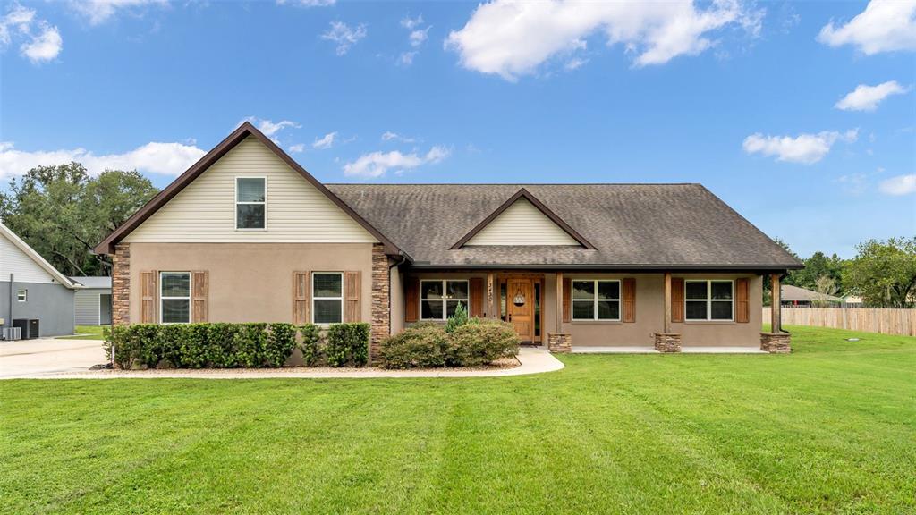 3430 North Galloway Road Lakeland, FL 33810 - Photo 1 of 84 a front view of house with yard and green space