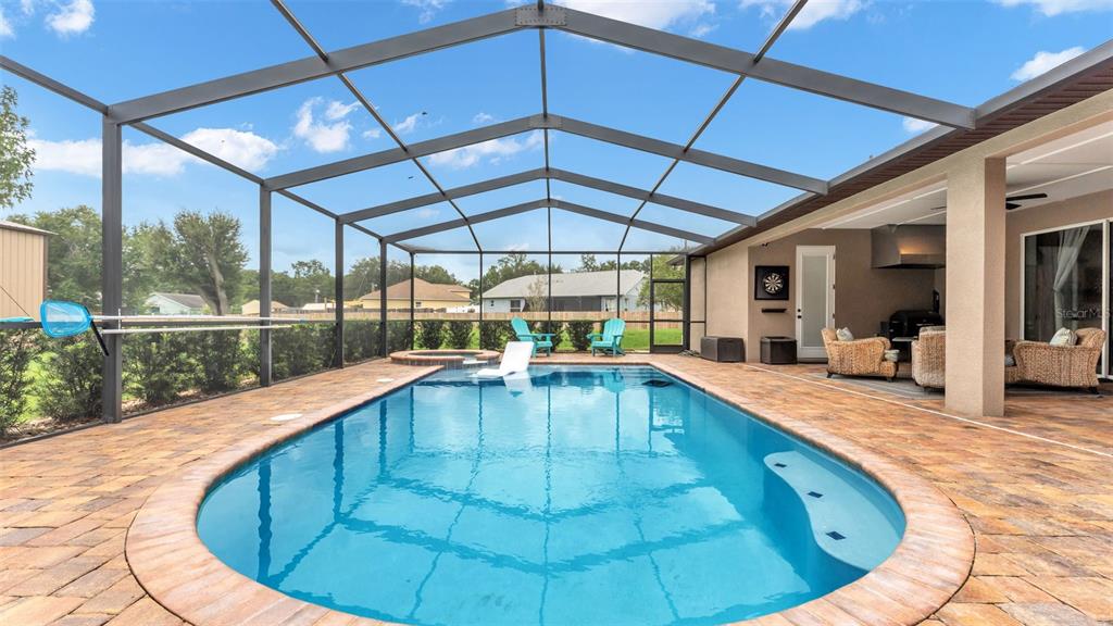 3430 North Galloway Road Lakeland, FL 33810 - Photo 2 of 84 a view of a swimming pool with a patio