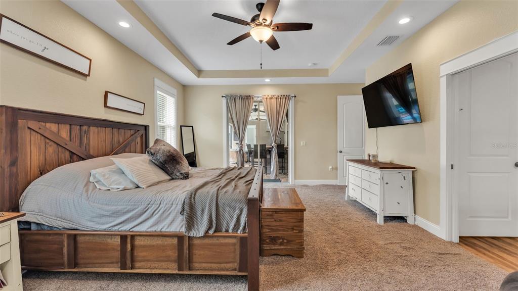 3430 North Galloway Road Lakeland, FL 33810 - Photo 22 of 84 a bedroom with a bed and a flat screen tv