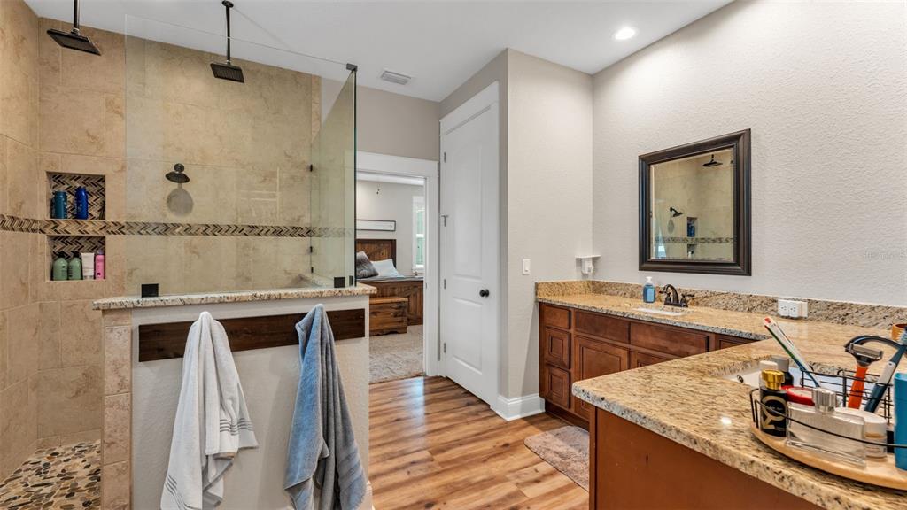 3430 North Galloway Road Lakeland, FL 33810 - Photo 29 of 84 a view of a kitchen with kitchen island a sink stove and wooden floor