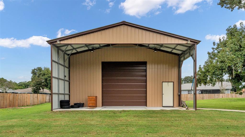 3430 North Galloway Road Lakeland, FL 33810 - Photo 3 of 84 a front view of a house with a yard