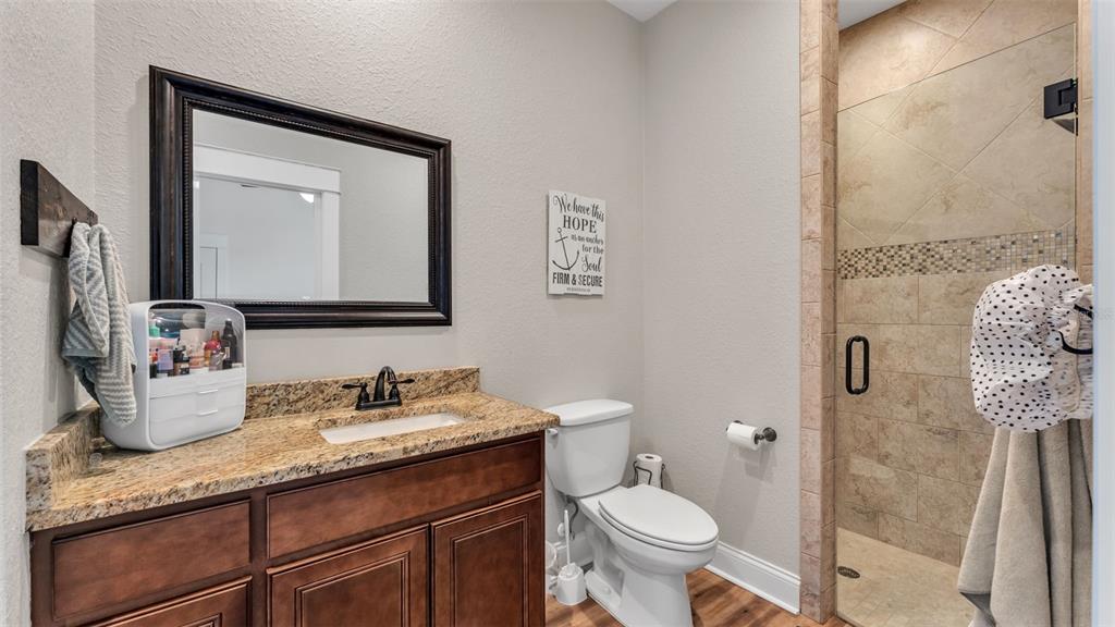 3430 North Galloway Road Lakeland, FL 33810 - Photo 40 of 84 a bathroom with a granite countertop sink and a mirror