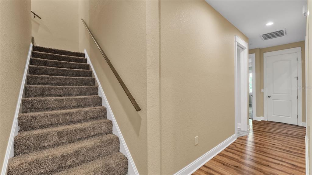 3430 North Galloway Road Lakeland, FL 33810 - Photo 45 of 84 a view of a hallway with wooden floor and entryway