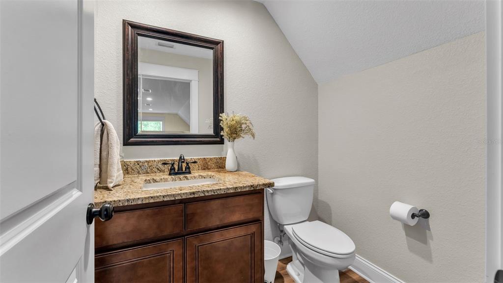 3430 North Galloway Road Lakeland, FL 33810 - Photo 49 of 84 a bathroom with a toilet sink and mirror
