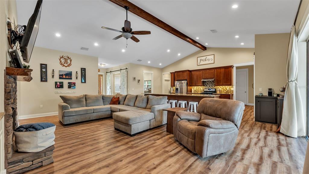 3430 North Galloway Road Lakeland, FL 33810 - Photo 5 of 84 a living room with furniture and kitchen view