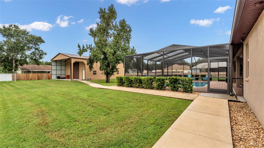3430 North Galloway Road Lakeland, FL 33810 - Photo 58 of 84 a front view of a house with a yard