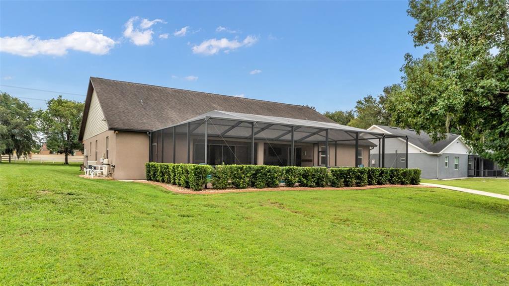 3430 North Galloway Road Lakeland, FL 33810 - Photo 62 of 84 a front view of house with yard and green space