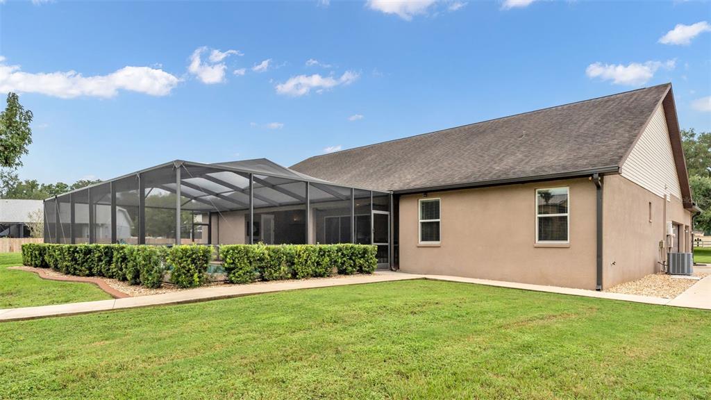 3430 North Galloway Road Lakeland, FL 33810 - Photo 63 of 84 a front view of house with yard and green space