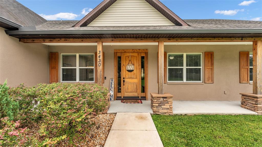 3430 North Galloway Road Lakeland, FL 33810 - Photo 66 of 84 a front view of a house with a yard