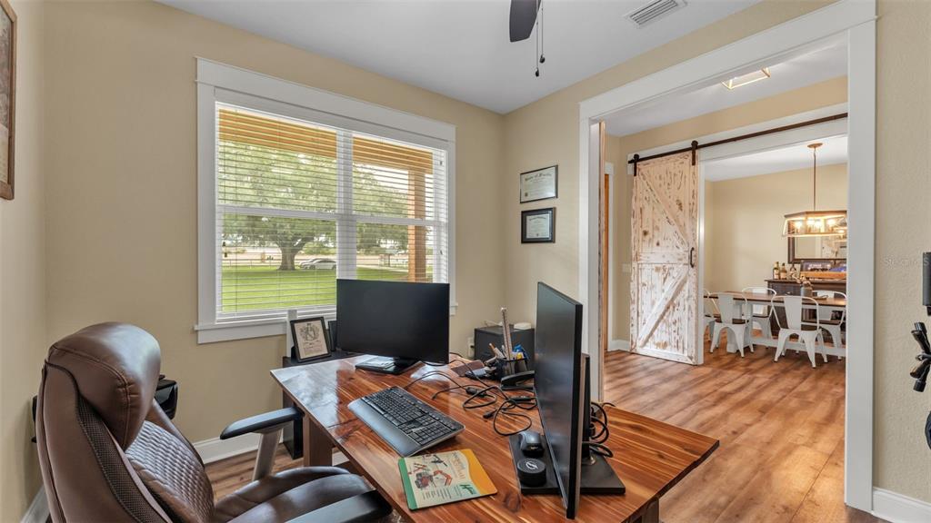 3430 North Galloway Road Lakeland, FL 33810 - Photo 8 of 84 a view of a workspace with furniture and a window