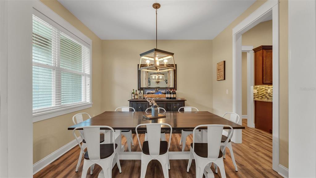3430 North Galloway Road Lakeland, FL 33810 - Photo 9 of 84 a view of a dining room with furniture and window