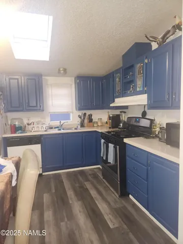 a view of backyard and deck