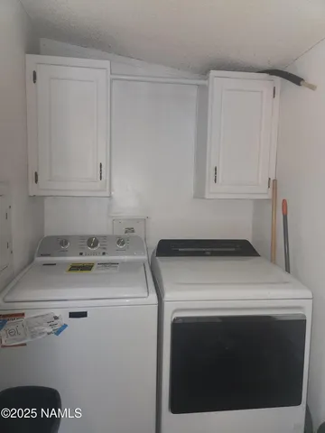 a bedroom with a bed and furniture