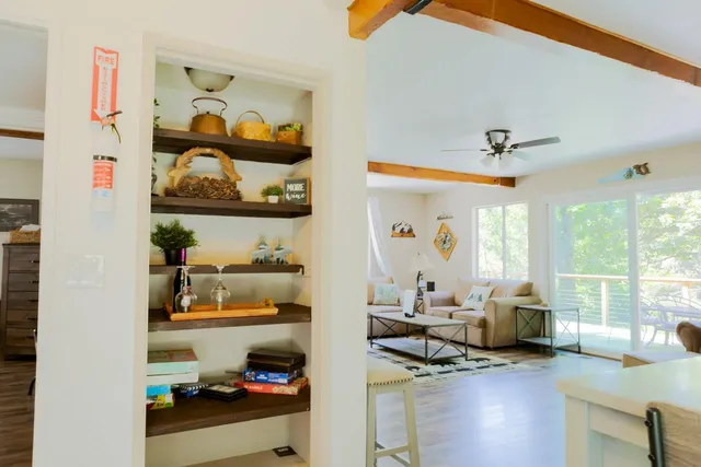 a room with furniture and a large window