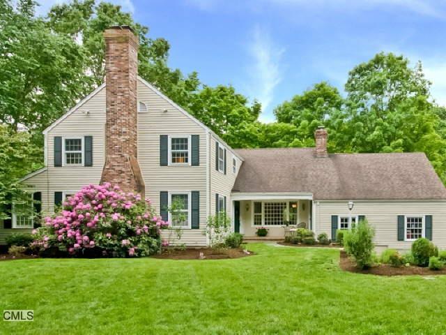 90 Pheasant Run Road Wilton, CT 06897 - Photo 1 of 1 a front view of house with yard and green space