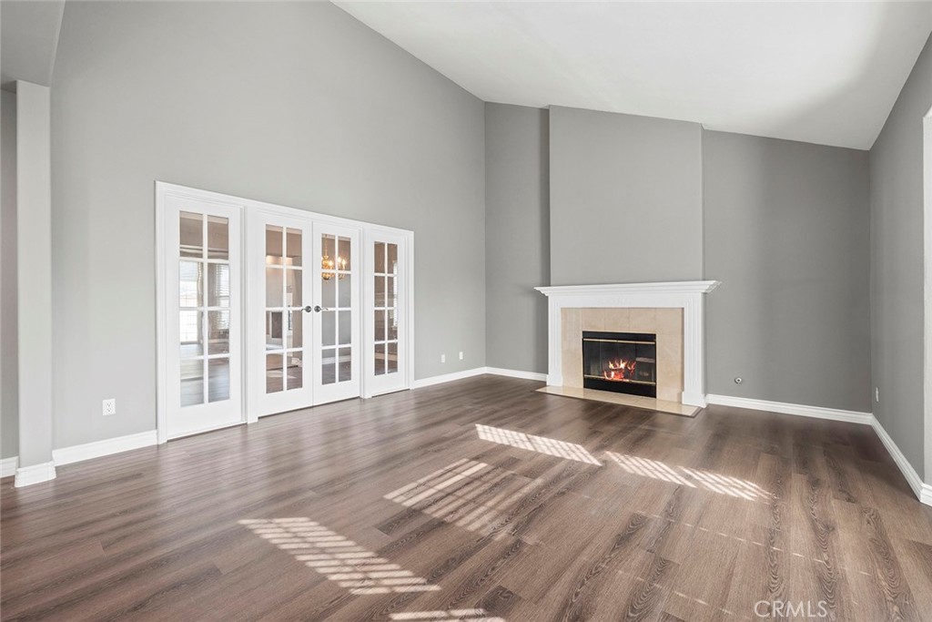 849 Balboa Drive Arcadia, CA 91007 - Photo 12 of 54 a view of an empty room with wooden floor and a window