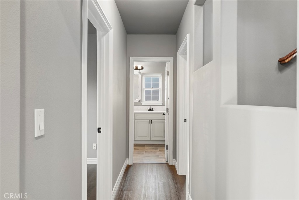 849 Balboa Drive Arcadia, CA 91007 - Photo 14 of 54 a view of a hallway with wooden floor and closet