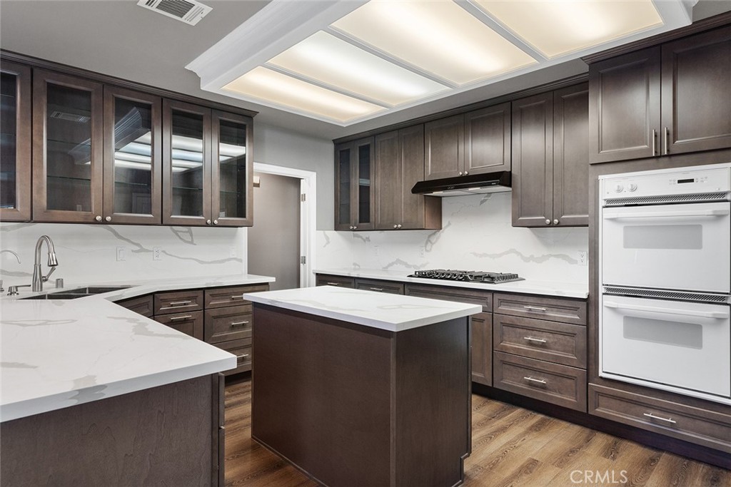 849 Balboa Drive Arcadia, CA 91007 - Photo 25 of 54 a kitchen with a sink stove and refrigerator