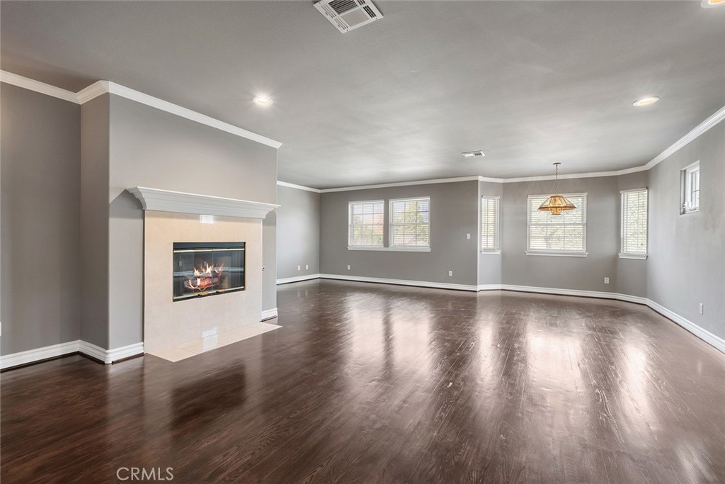 849 Balboa Drive Arcadia, CA 91007 - Photo 34 of 54 a view of an empty room with wooden floor and a window